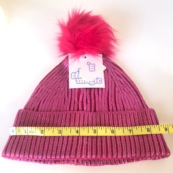 More Than Magic Girls' Ribbed Beanie Hat with Pom Metallic Pink OSFM - Picture 7 of 8